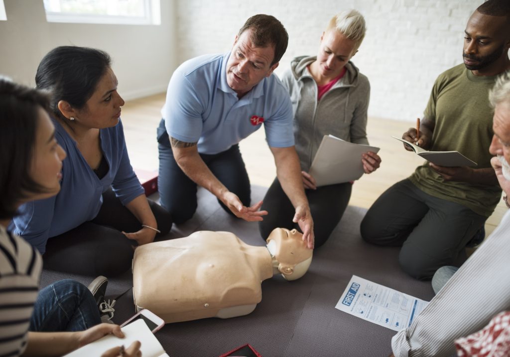 CPR Charlotte. CPR instructor teaching class